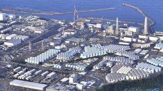日本開始拆解福島核污染水空罐