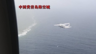 菲軍機非法闖入中國南沙島礁附近空域，南部戰區全程掌握、警告驅離