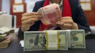 漲超200點(diǎn)，在岸、離岸人民幣對美元匯率一度升破7.23