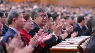 全国政协十四届三次会议闭幕会通过了提案审查情况报告