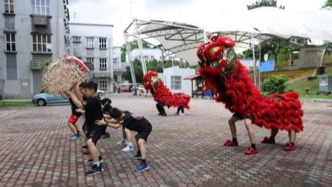 從習主席署名文章看大國外交 | 走近馬來舞獅少年，感受“切水不斷”世代情誼