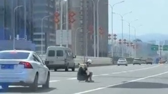 女生乘降落傘空降南昌朝陽大橋，航空運動協會：違規自行飛行