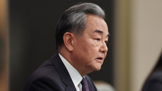 王毅：为改革完善全球治理作出金砖贡献