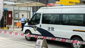 今日二審宣判，押送李鐵的警車進(jìn)入法院