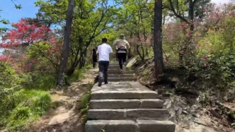 机器人用在何处丨体验穿“机器腿”登山，180斤游客称“感觉很轻松”