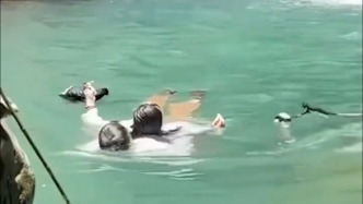 救了一個家！女子從瀑布墜入深潭，52歲的他冒險跳水救人