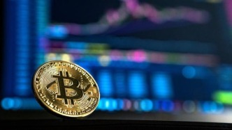 比特币价格突破11万美元，再创历史新高