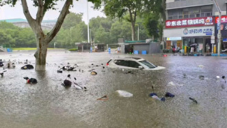 武汉发布暴雨临灾警报，14处渍水点小车均不可通行