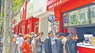 人民日?qǐng)?bào)觀察：“阿大蔥油餅”煥新，上?！岸喔窈弦弧苯鉀Q基層治理難題