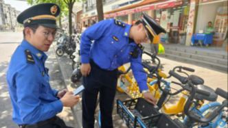 共享單車上的非法小廣告層出不窮？上海徐匯城管開展專項治理