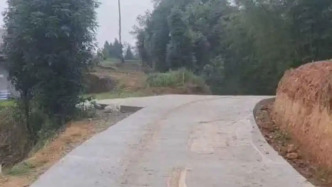 宜賓一農(nóng)村公路多年修不通追蹤：永興鎮(zhèn)稱系機(jī)耕路，符合要求
