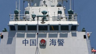 中国海警局新闻发言人正告菲方：任何侵权伎俩都是徒劳