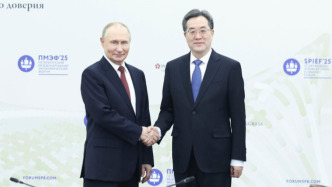 丁薛祥会见俄罗斯总统普京