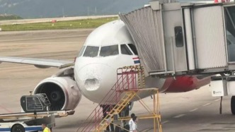 一航班落地后被发现风挡破裂且机头凹陷，亚洲航空：天气原因导致