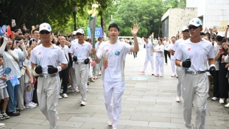 成都世运会火炬“竹梦”抵达金沙遗址博物馆