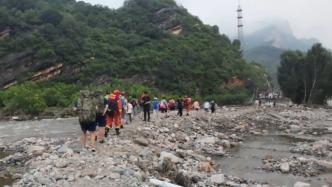 极值暴雨之下，北京密云的红警与抗汛