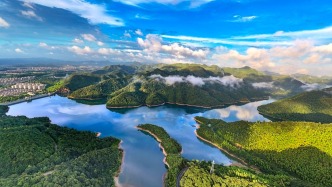 澎湃讀報(bào)丨央媒頭版頭條集中刊發(fā)：“兩山”理念改變中國引領(lǐng)時(shí)代