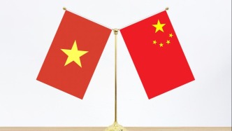 王小洪同越共中央政治局委員、越南公安部部長(zhǎng)梁三光視頻通話