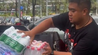 台风“剑鱼”过境三亚，市民赠餐送水支援一线救援
