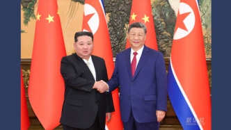 習近平同朝鮮勞動黨總書記、國務委員長金正恩舉行會談