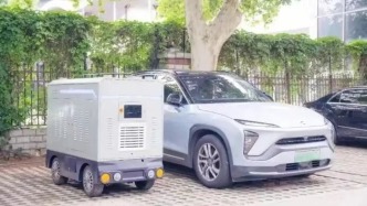 光明網(wǎng)評論員：像“點外賣”一樣便捷，電車充電盼新解