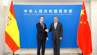 商务部部长王文涛会见西班牙经济、贸易与企业大臣奎尔波