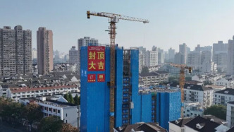 上海一原拆原建项目主体封顶，原住居民参观样板间监督质量