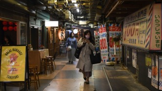 鏡頭內(nèi)外｜東京切片：抗議人群與冷清商鋪