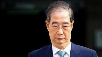 韩国检方要求判处前国务总理韩德洙15年监禁