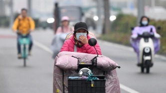 北京：明年5月1日起騎電動(dòng)車強(qiáng)制佩戴頭盔、不得看手機(jī)