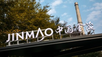 中国金茂抵押“金茂大厦”部分楼层，获得99亿元银团贷款