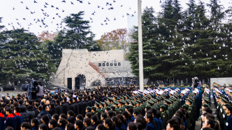 人民日报钟声：防止日本军国主义死灰复燃是正义力量的共同意志