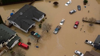 美國華盛頓州持續(xù)強(qiáng)降雨：多條河流水位線超警，洪災(zāi)損失嚴(yán)重