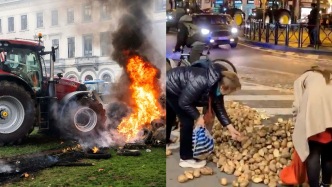 歐洲農(nóng)民開(kāi)拖拉機(jī)圍堵歐盟，現(xiàn)場(chǎng)魔幻一幕：民眾撿土豆當(dāng)免費(fèi)食物