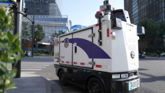 無人駕駛“警車”已在上海街頭巡邏，其中一臺一天提醒119輛違停車