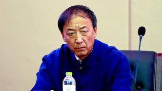 中国足球协会纪律委员会原主任王小平受贿案二审维持原判