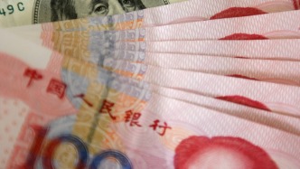 人民幣對(duì)美元即期匯率升破“7”，今年已累計(jì)升值4%