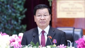 通倫當(dāng)選老撾人革黨第十二屆中央委員會(huì)總書記