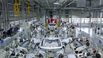 經(jīng)濟(jì)日?qǐng)?bào)金觀平：以央企新?lián)?dāng)更好服務(wù)大局