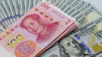 人民幣對(duì)美元即期匯率升至6.97，創(chuàng)近32個(gè)月新高