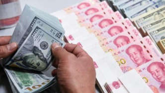 人民币对美元即期汇率升破6.96，创32个月新高