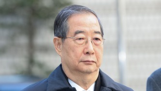 韩国前国务总理韩德洙就一审被判有期徒刑23年提起上诉