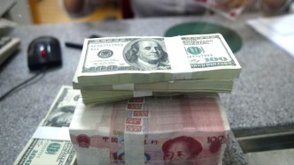 1月人民幣對(duì)美元即期匯率升值近0.58%