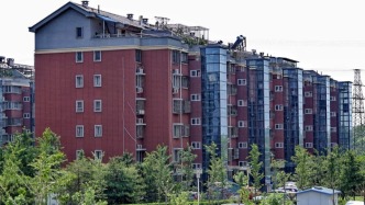 龔正：推進(jìn)老舊住宅加裝、更新電梯