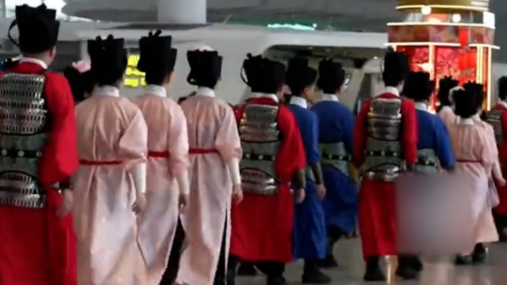 千年风雅融入现代出行!广州白云机场工作人员穿汉服迎春运