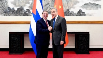 ​王毅同古巴党和政府特使、古共中央政治局委员、外交部长罗德里格斯会谈