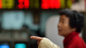 A股银行股全面飘红：厦门银行涨停，上海银行涨超4%