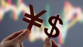 在岸、离岸人民币对美元汇率双双升破6.91