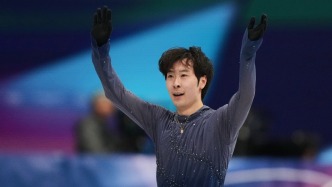 完成第三届冬奥会之旅，米兰冰面上的金博洋很幸福