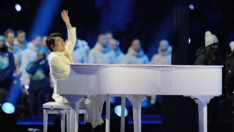 郎朗人民日报撰文：黑白键上流淌的奥运情缘